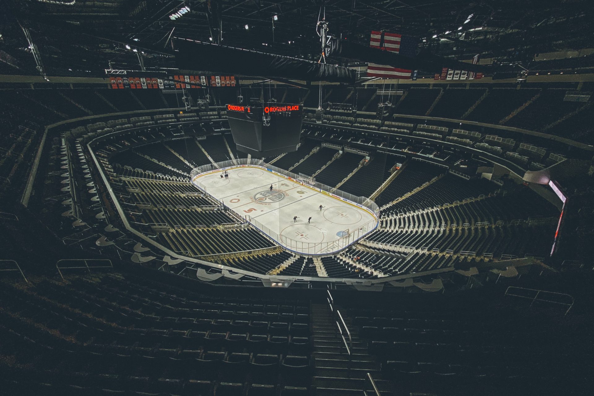 empty arena with players on the ice